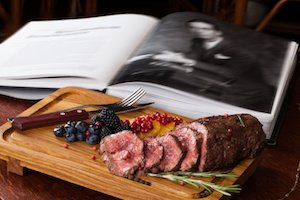 meat with berries still life business man